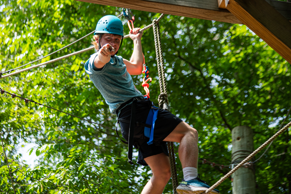 High School Camper in the ropes course